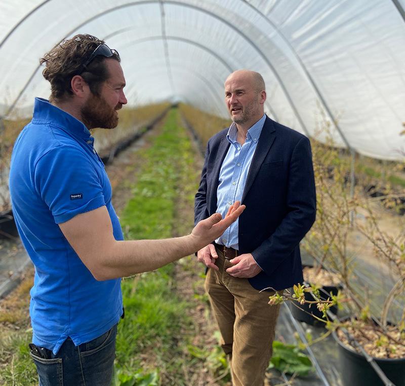 david talks with client polytunnel